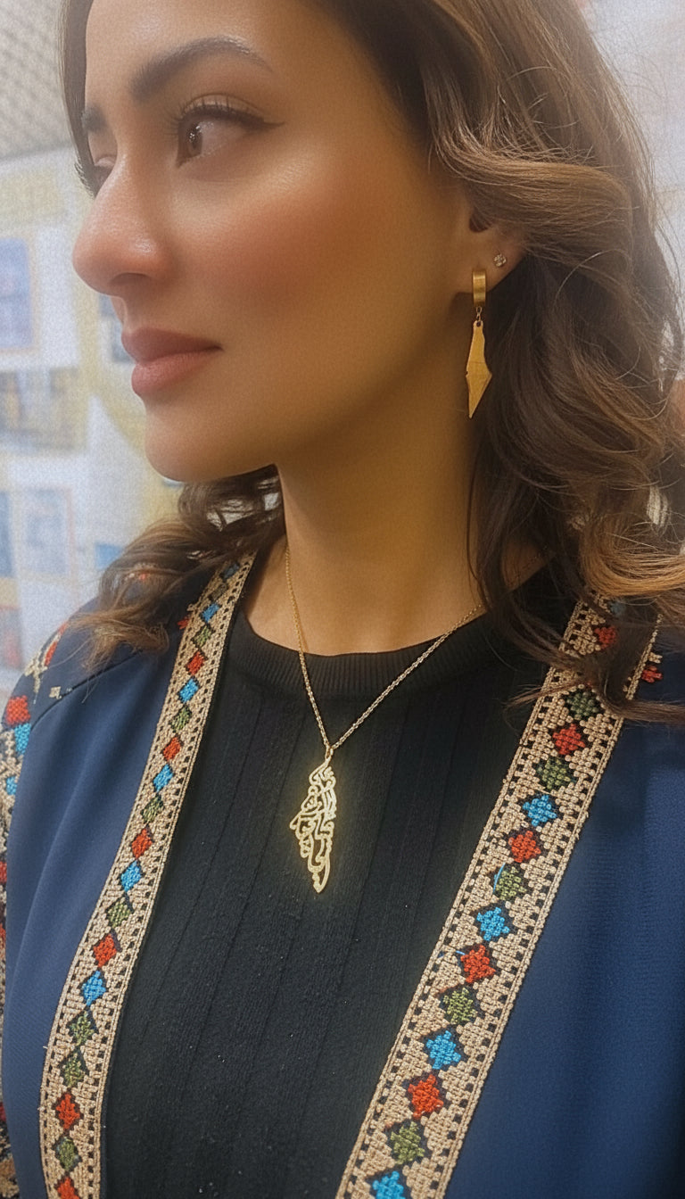 Palestine Map Pendant Arabic Caligraphy "We Have On This Earth What Makes Life Worth Living "

 على هذه الأرض ما يستحق الحياة