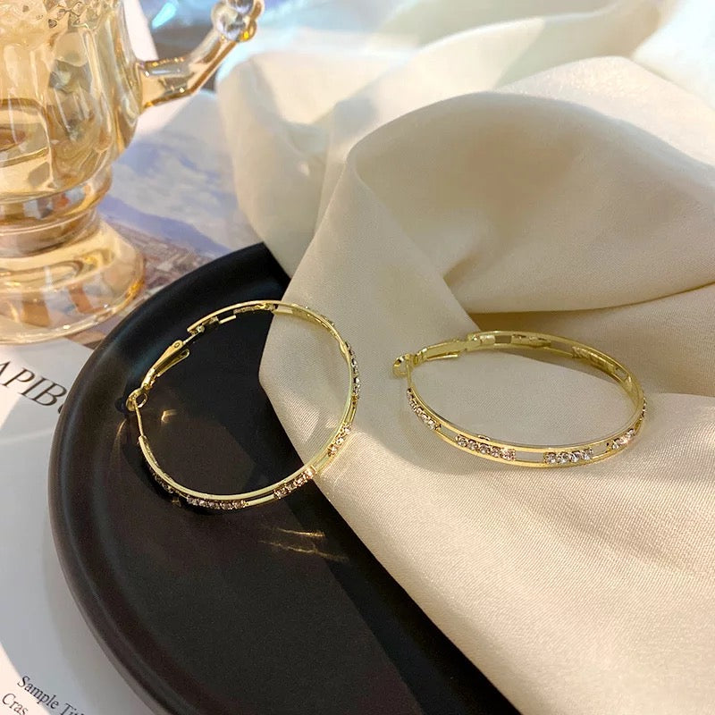 Hoop earrings with cubic zirconia stones