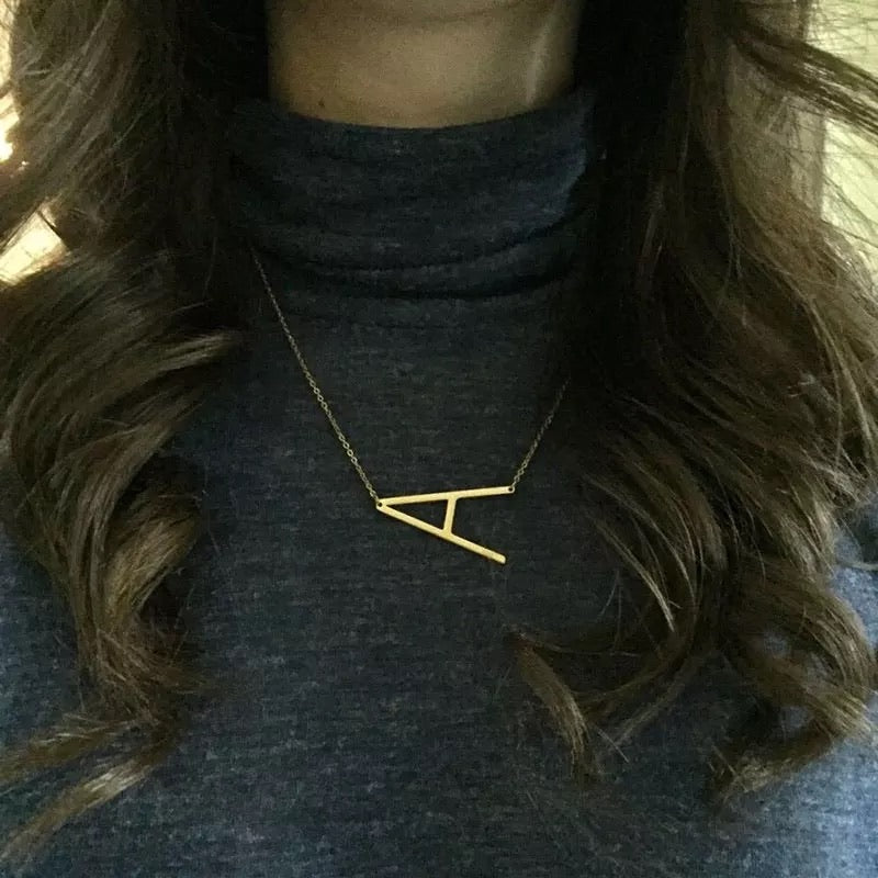Asymmetrical Large letter initial