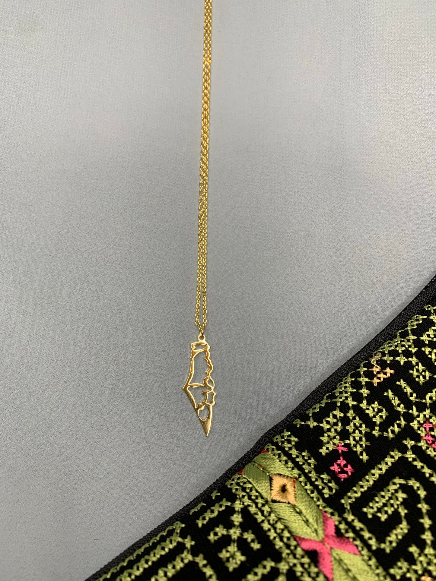 Palestinian gold pendant