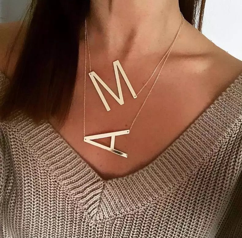 Asymmetrical Large letter initial