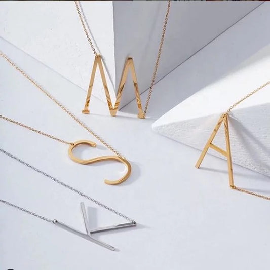 Asymmetrical Large letter initial