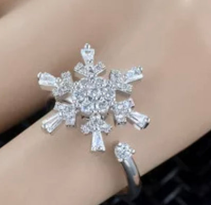 Rotating snowflake calming ring
